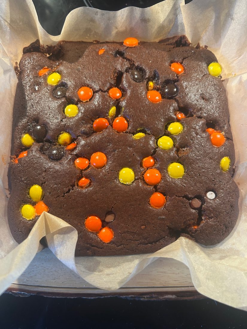 Finished brownies fresh out of the oven with a cracked top